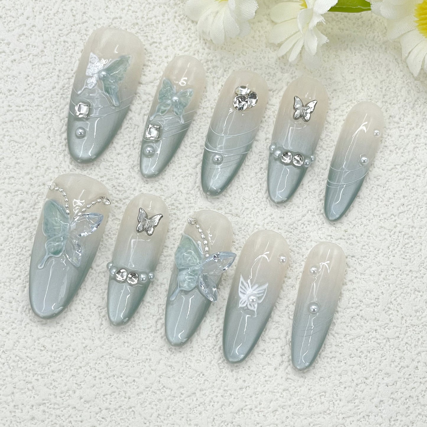 Icy Blue Cat Eye Gradient Almond Nails with Crystal Butterfly Accents, Handmade – Dreamy and Elegant Glow(154)