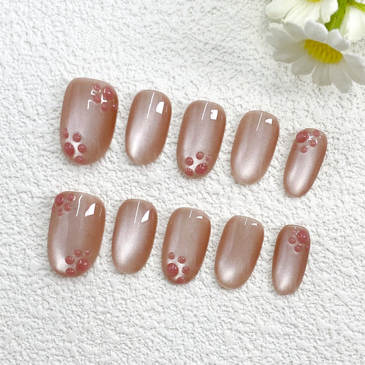 Sweet Pink Press On Nails – Soft Glitter Base with Cute Paw-Like Dots, Perfect for a Fresh & Girly Look（257