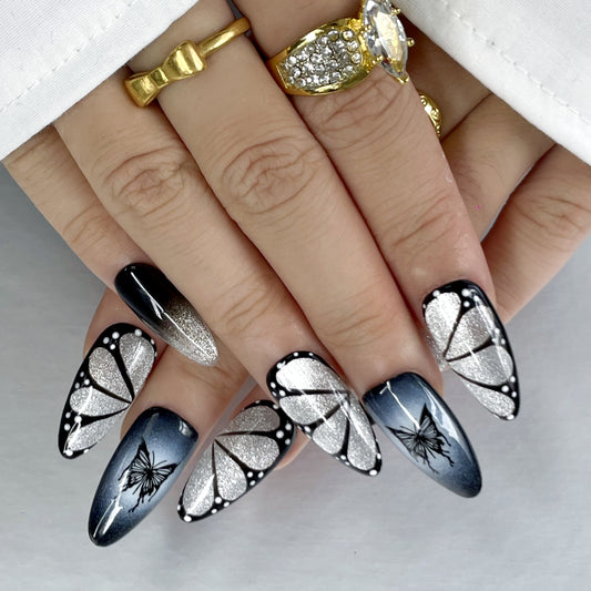 Edgy Long Nails – Dark Glam with Glitter & Butterfly Accents（K63）